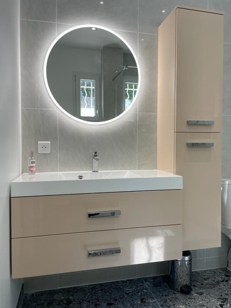 Inspiration for a small modern 3/4 bathroom in Other with flat-panel cabinets, a curbless shower, a one-piece toilet, gray tile, ceramic tile, white walls, ceramic floors, a console sink, wood benchtops, grey floor, green benchtops, a double vanity, a floating vanity and beige cabinets.