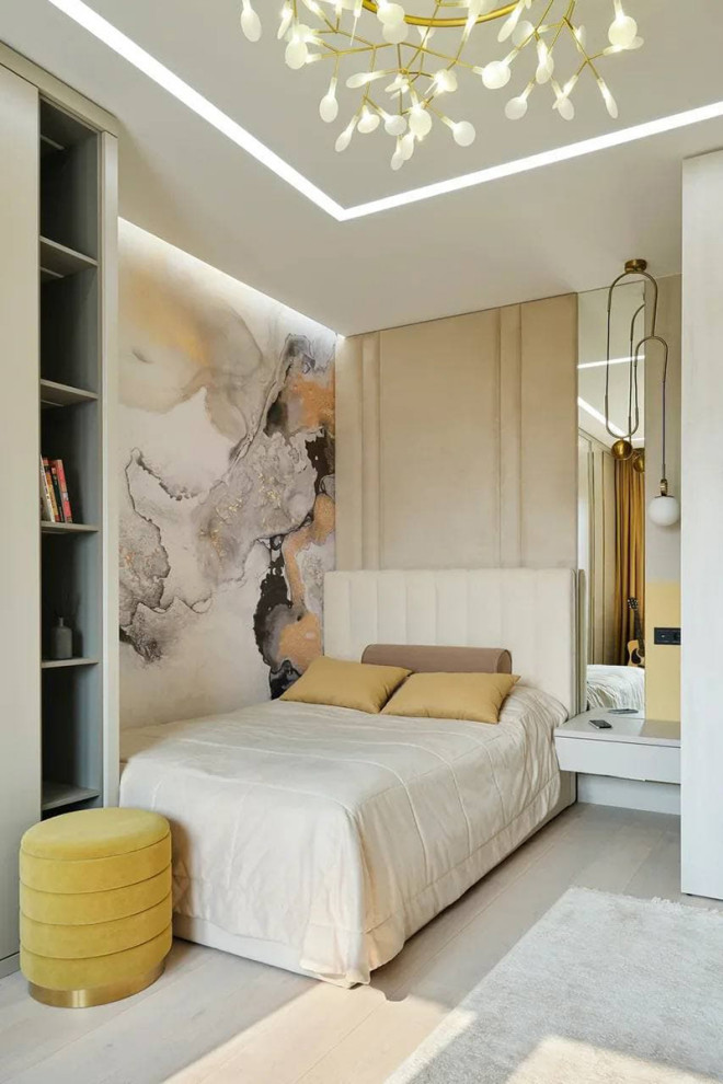 Idées déco pour une chambre d'enfant contemporaine avec un mur beige et parquet clair.