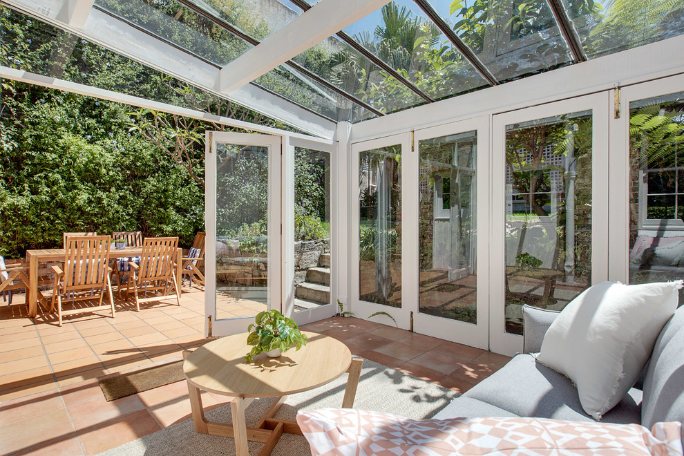 This is an example of a small scandinavian sunroom in Sydney.