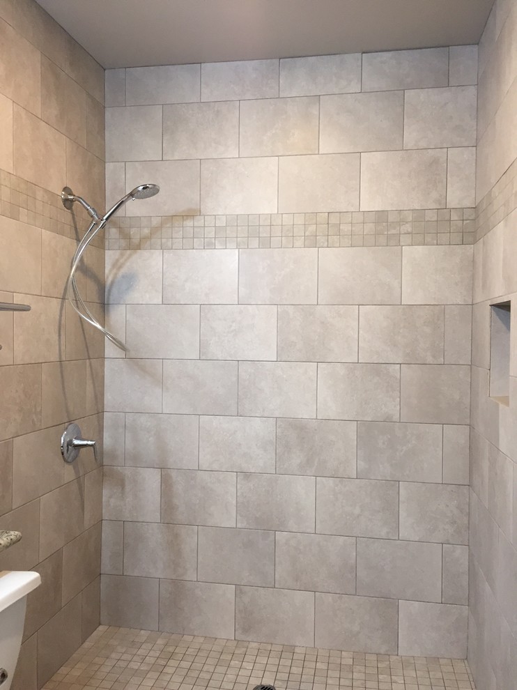 Small contemporary master bathroom in Other with shaker cabinets, grey cabinets, an open shower, a two-piece toilet, gray tile, porcelain tile, vinyl floors, a drop-in sink and granite benchtops.