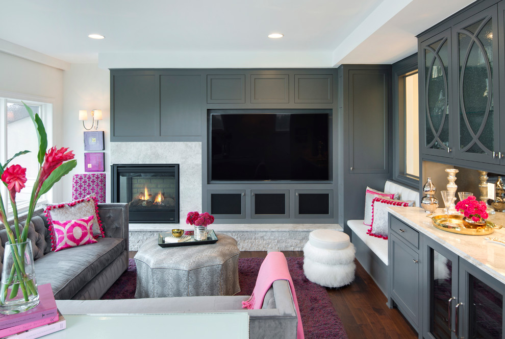 Photo of a transitional family room in Minneapolis with a home bar, dark hardwood floors, a corner fireplace, a built-in media wall and white walls.