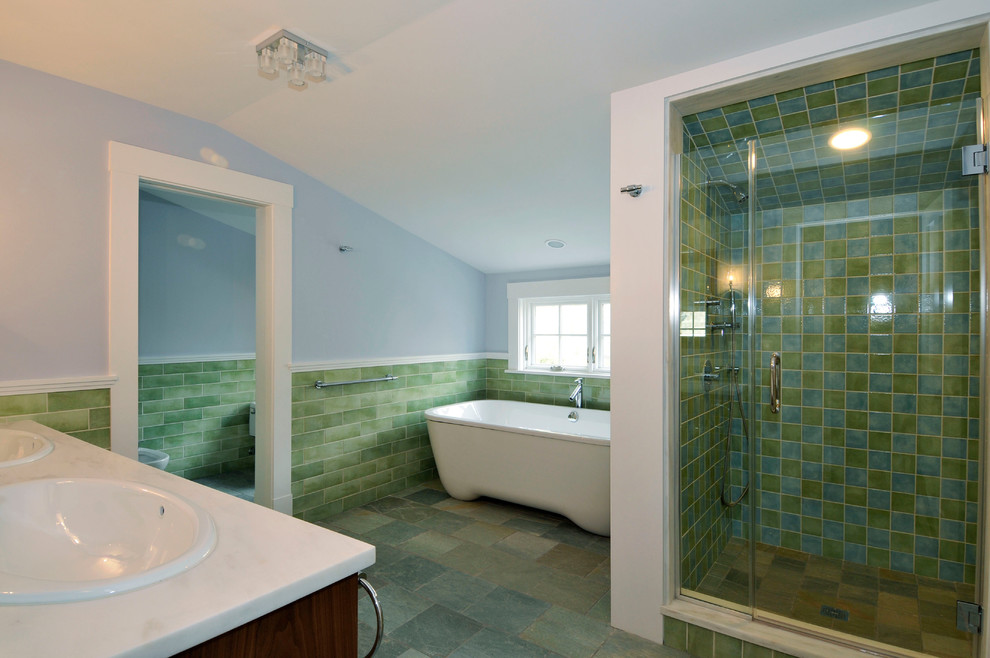 Photo of a large contemporary master bathroom in New York with medium wood cabinets, a freestanding tub, an alcove shower, blue tile, green tile, subway tile, blue walls, slate floors, a drop-in sink and engineered quartz benchtops.