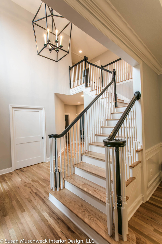 Staircase - mid-sized transitional light wood floor staircase idea