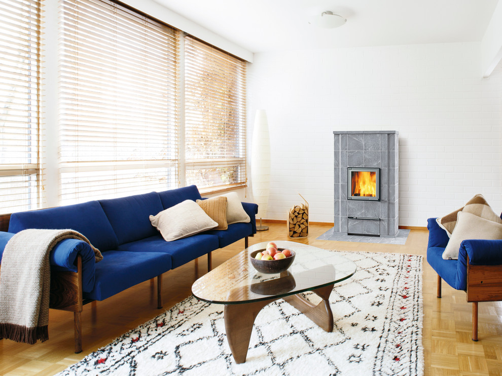 Photo of a scandinavian living room in Gloucestershire with a wood stove.