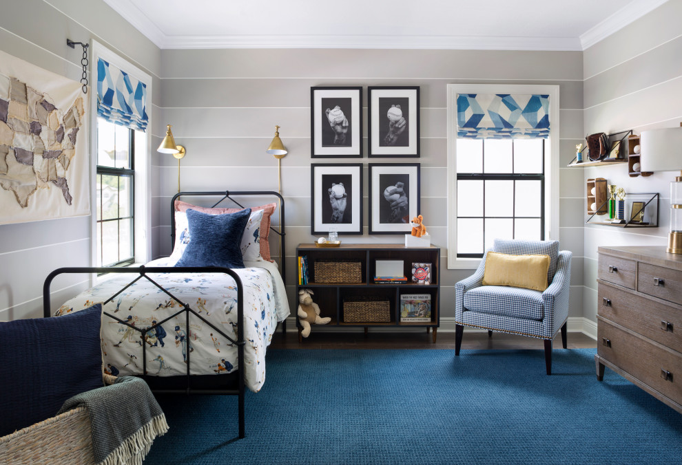 Future Baseball Player - When you dad is a professional pitcher, it is pretty easy to decide that you want a baseball themed bedroom.  Our client had various pitching grips photographed which are the focal point of this space and will be an heirloom for the family.  Stripes in muted tones wrap around the entire room and will be a backdrop as the little boy grows up.  A classic iron bed topped with vintage baseball themed bedding add subtle color and pattern. Reading lamps above the bed make bedtime story time easy.