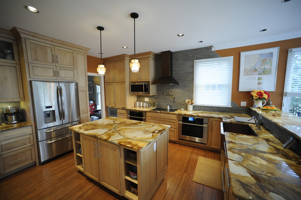Eat-in kitchen - mid-sized transitional u-shaped light wood floor eat-in kitchen idea in Baltimore with a farmhouse sink, beaded inset cabinets, light wood cabinets, onyx countertops, stainless steel appliances and an island