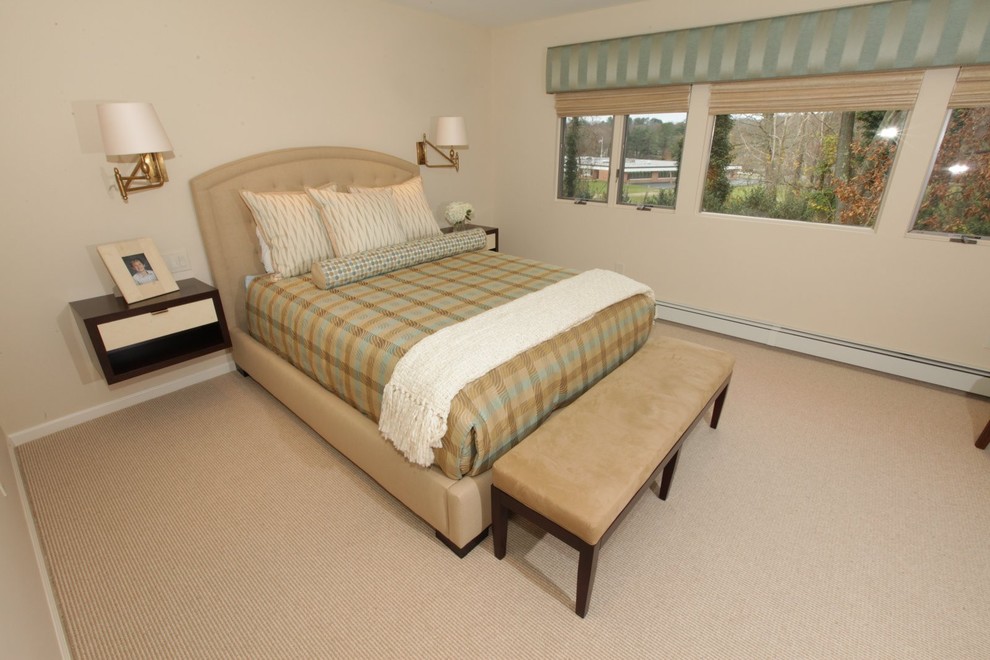 Example of a mid-sized trendy guest carpeted bedroom design in New York with beige walls