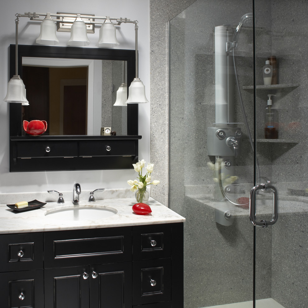 This is an example of a world-inspired bathroom in San Francisco with black cabinets.