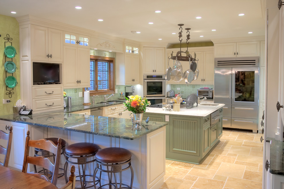 Inspiration for a mid-sized traditional u-shaped eat-in kitchen in Chicago with a double-bowl sink, raised-panel cabinets, white cabinets, marble benchtops, green splashback, porcelain splashback, stainless steel appliances, ceramic floors and multiple islands.
