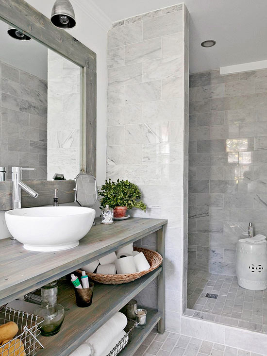 Photo of a contemporary bathroom in Los Angeles with a vessel sink, open cabinets, light wood cabinets, wood benchtops, a corner shower, a one-piece toilet, gray tile and stone tile.