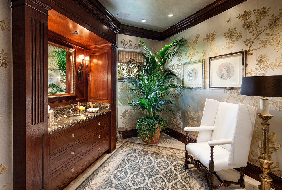 Inspiration for a traditional powder room in Los Angeles with an undermount sink, furniture-like cabinets, dark wood cabinets and multi-coloured walls.