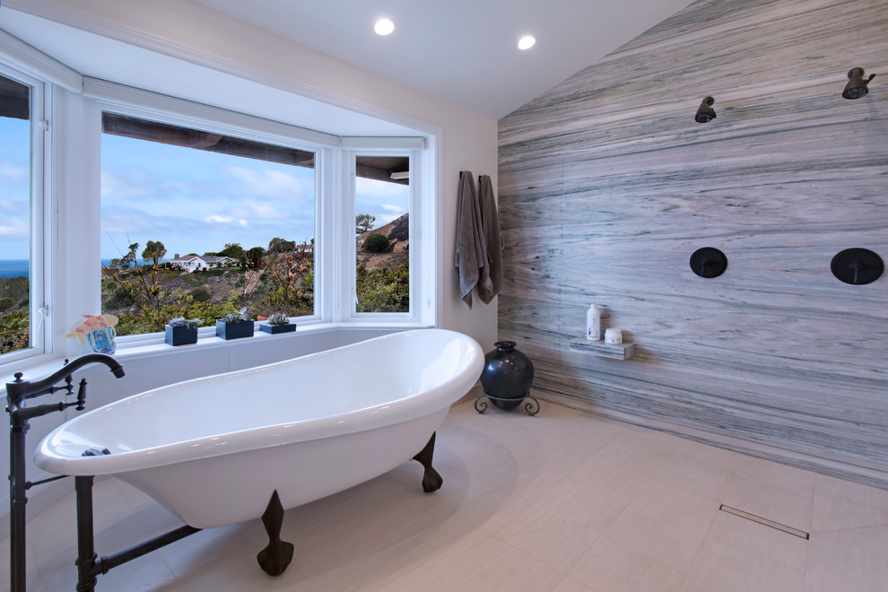 Design ideas for a large transitional master bathroom in Los Angeles with an undermount sink, shaker cabinets, white cabinets, marble benchtops, a claw-foot tub, an open shower, a two-piece toilet, stone tile, white walls, marble floors, beige tile and beige floor.
