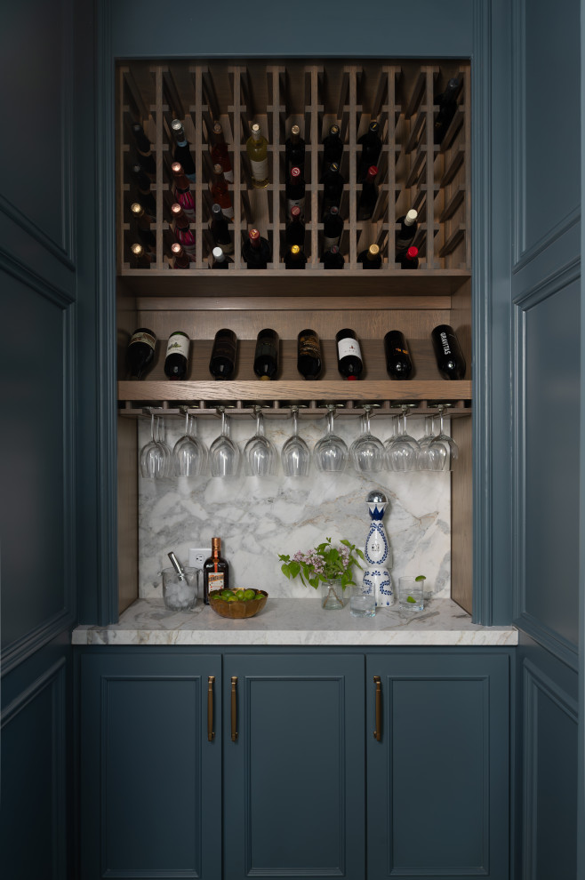 Wine cellar - small transitional wine cellar idea in Houston