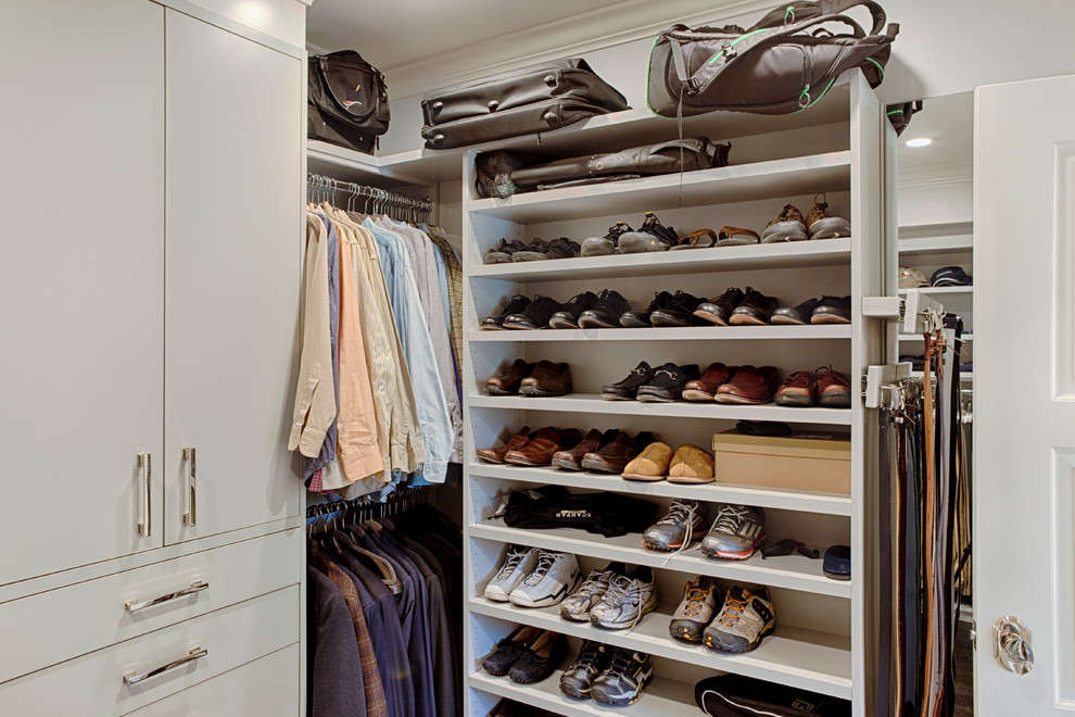 Inspiration for a large transitional gender-neutral walk-in wardrobe in Philadelphia with flat-panel cabinets and grey cabinets.