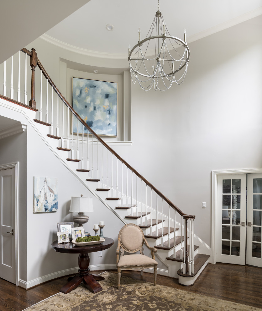 Inspiration for a large foyer in Nashville with grey walls, medium hardwood floors and brown floor.
