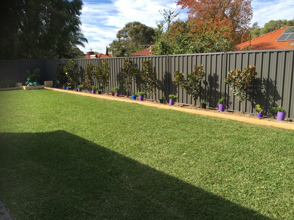 Photo of an industrial side yard garden in Perth.