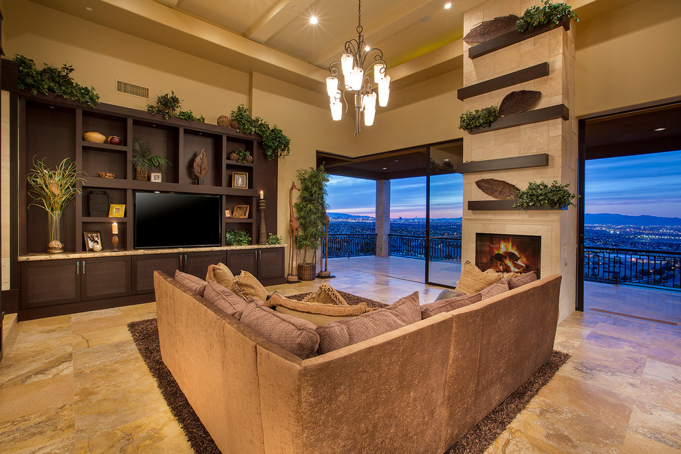 This is an example of an asian formal living room in Las Vegas with yellow walls, a standard fireplace, a tile fireplace surround and a built-in media wall.