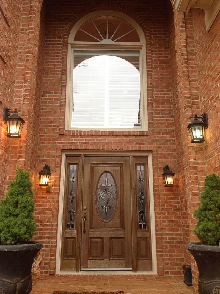 Large traditional front door in Atlanta with a single front door and a dark wood front door.