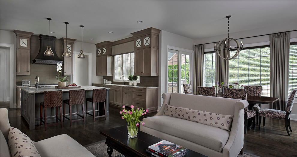 Mid-sized transitional open plan dining in Detroit with grey walls, dark hardwood floors and no fireplace.