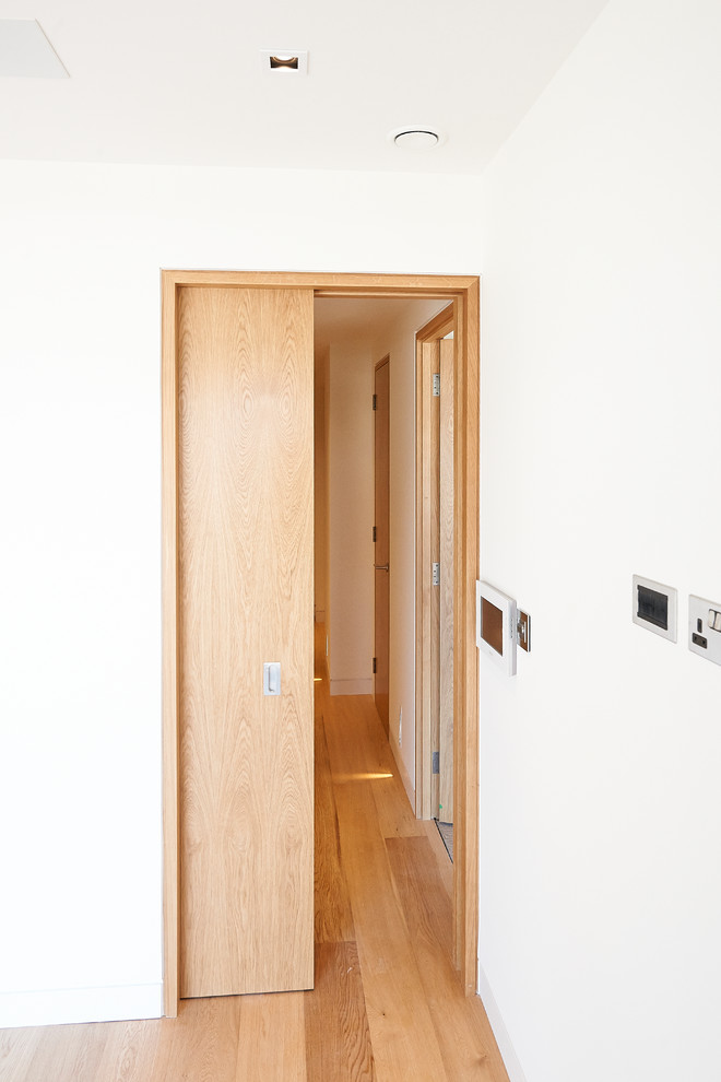 This is an example of a contemporary hallway in Buckinghamshire.