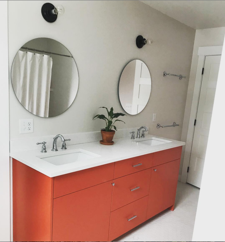 Modern bathroom with furniture-like cabinets, orange cabinets, white tile, quartzite benchtops and white benchtops.