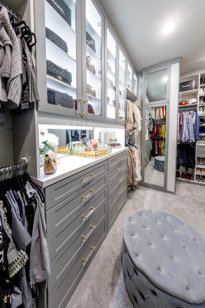 This is an example of a large traditional storage and wardrobe in Houston.