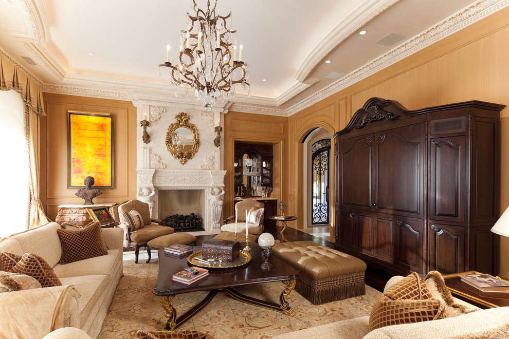 Large mediterranean formal enclosed living room in Chicago with dark hardwood floors, a stone fireplace surround and a concealed tv.