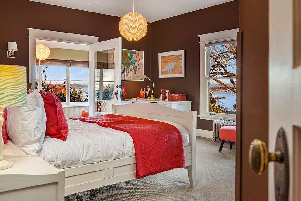 Large transitional kids' room in Seattle with brown walls and carpet for girls.