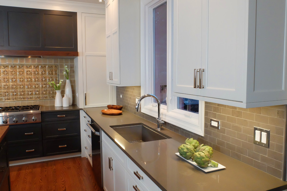 Kitchen - large transitional u-shaped medium tone wood floor kitchen idea in Chicago with an undermount sink, shaker cabinets, white cabinets, stone tile backsplash, stainless steel appliances, wood countertops, gray backsplash and an island