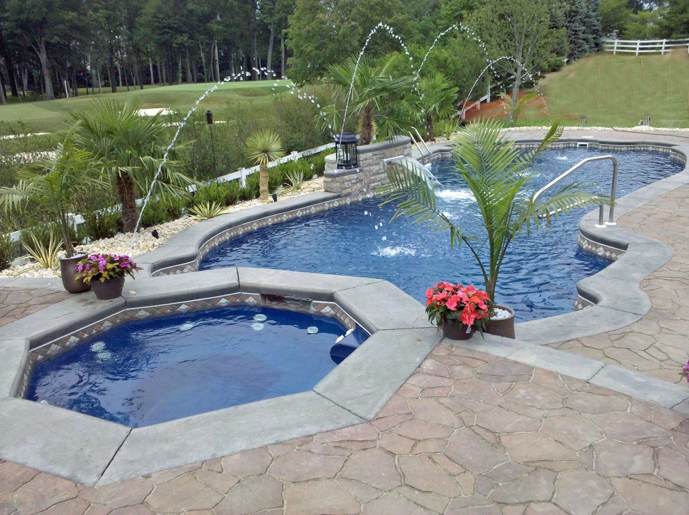 This is an example of a beach style pool in Atlanta.