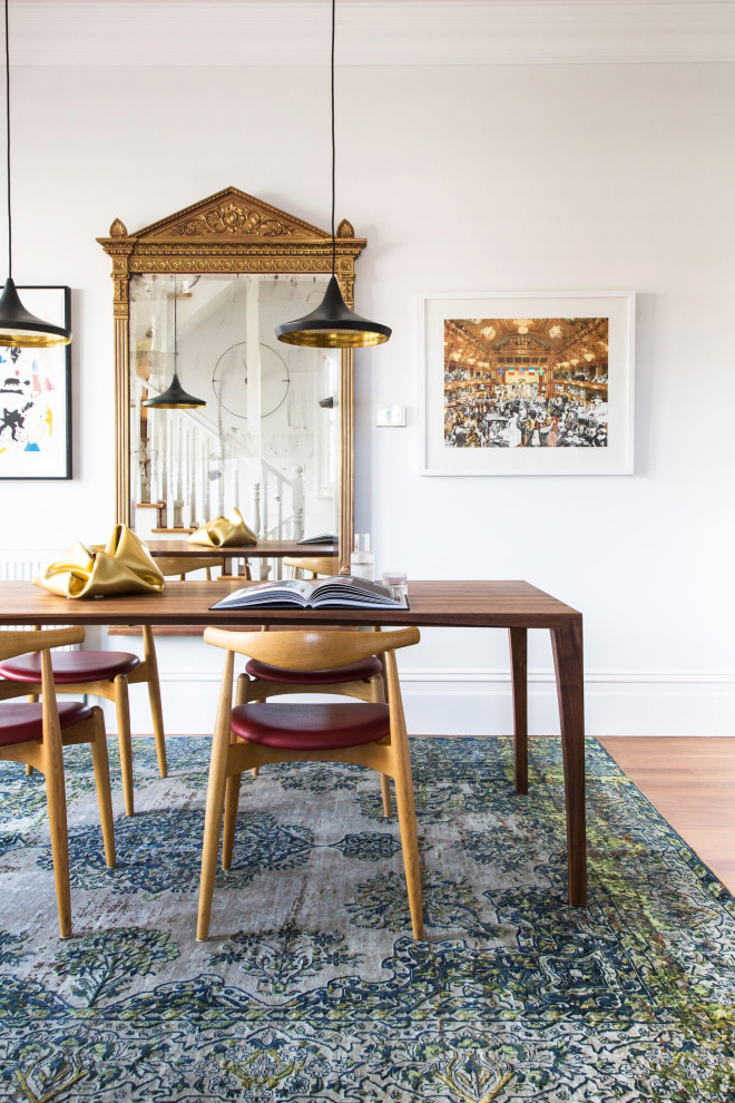 Inspiration for a mid-sized eclectic kitchen/dining combo in Melbourne with white walls.