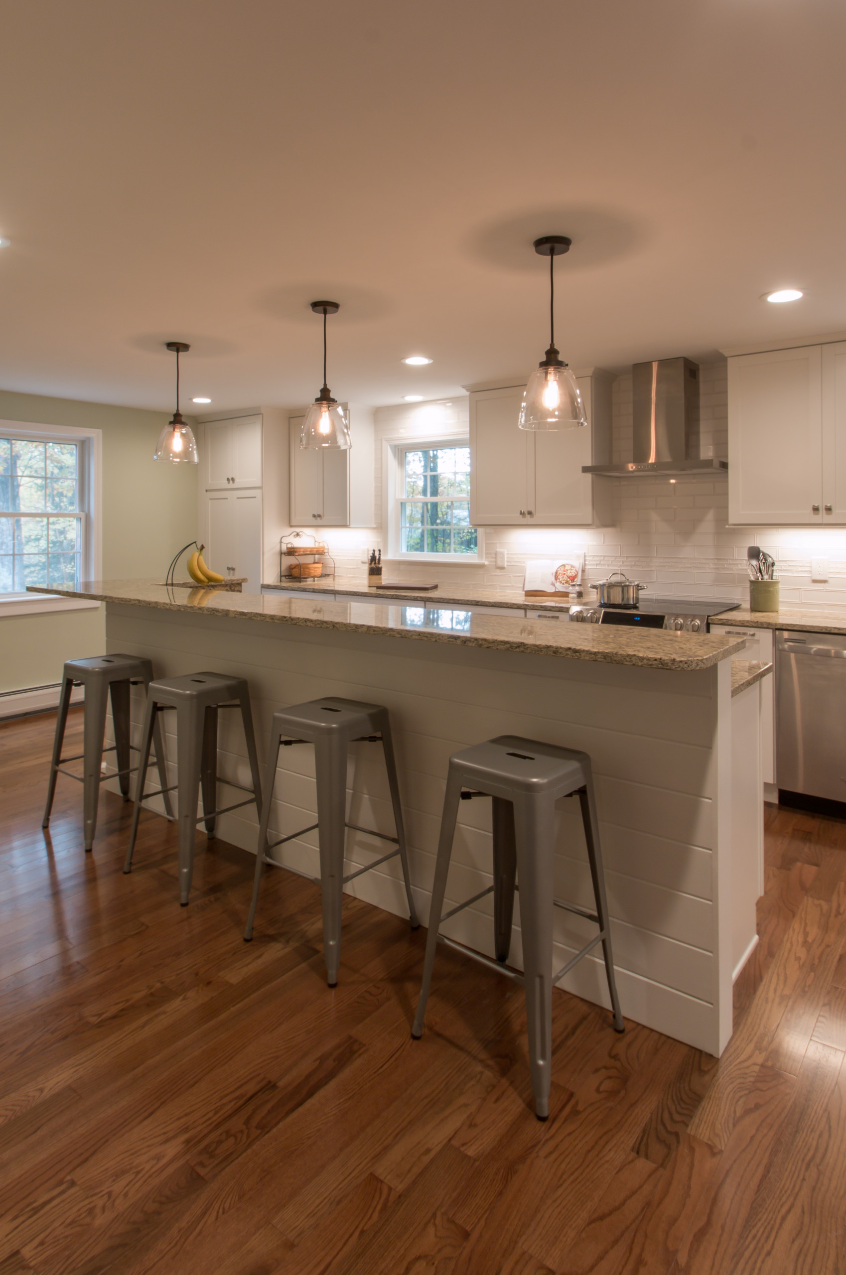 Kitchen Business in the front, shiplap in the back.  This island kitchen has sty
