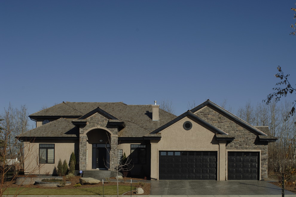 Transitional home design photo in Edmonton