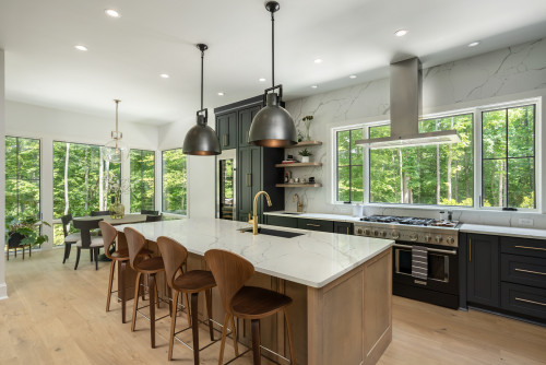 Contemporary kitchen example for how to choose IKEA kitchen cabinet colors with dark cabinets, wood tones, and large windows