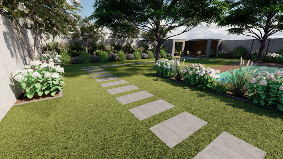 Foto di un grande giardino formale minimalista esposto a mezz'ombra davanti casa in estate con gazebo, pavimentazioni in pietra naturale e recinzione in pietra