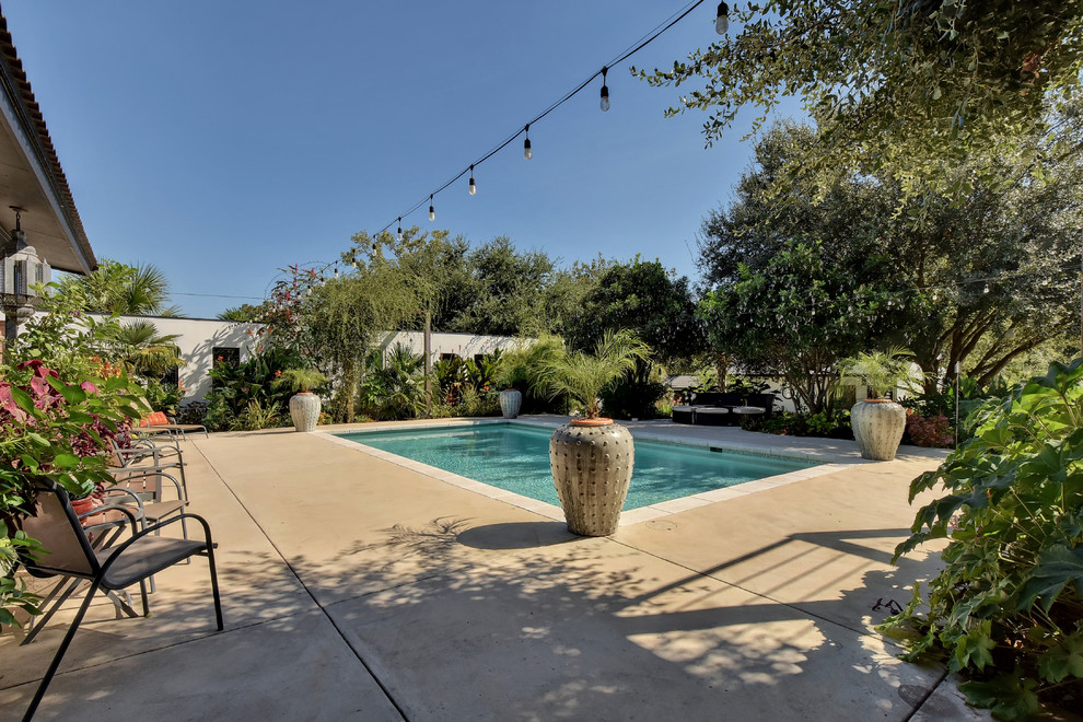 Eclectic pool photo in Austin