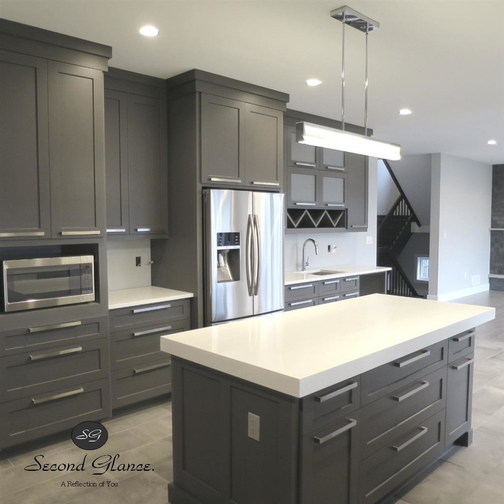 Example of a transitional kitchen design in Toronto