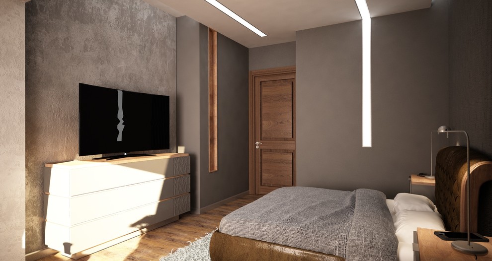 Гостиная двухэтажной квартиры для молодого одинокого мужчины в Москве