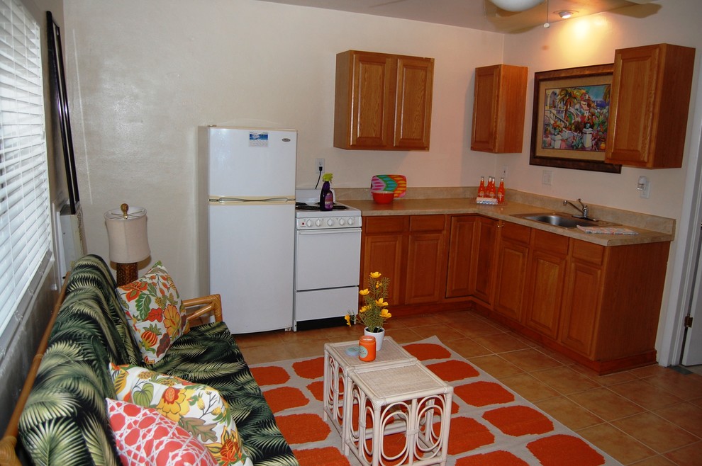 This is an example of a beach style kitchen in Tampa.