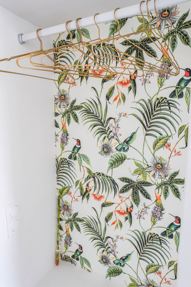 Design ideas for a tropical storage and wardrobe in Other.