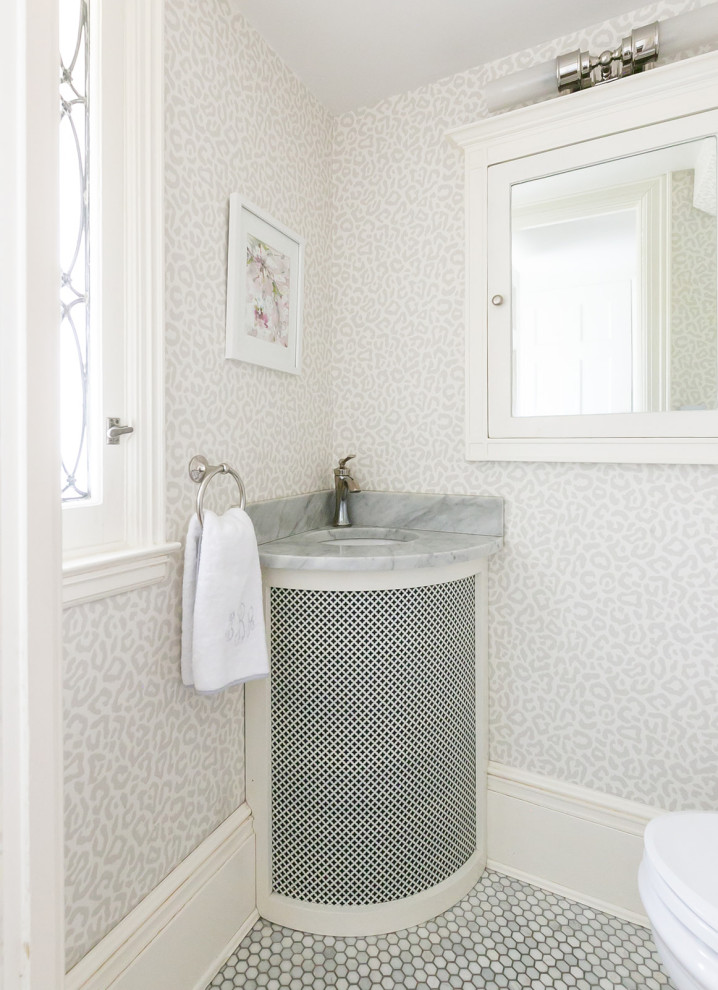 Inspiration for a small classic cloakroom in Baltimore with grey walls, marble flooring, an integrated sink, marble worktops, grey worktops, a built in vanity unit and wallpapered walls.