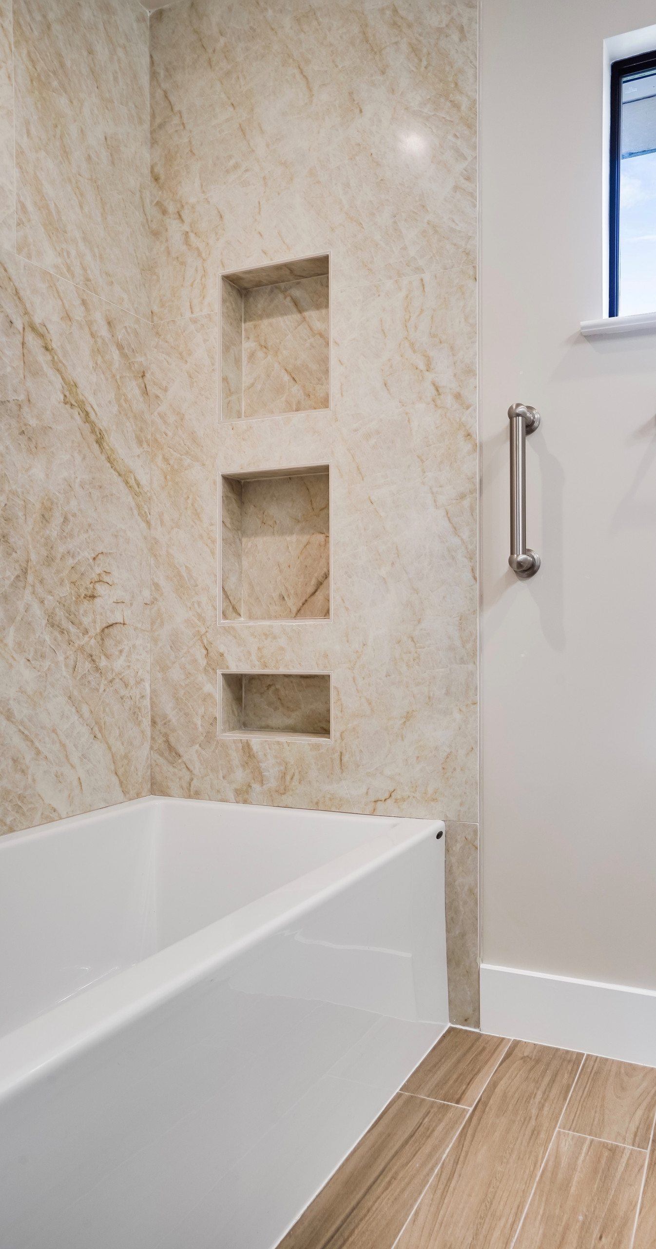 Tub Shower Combination with Shampoo Niches and Grab Bar