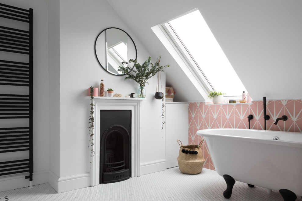 This is an example of a large modern kids bathroom in Kent with a freestanding tub, pink tile, white walls, a hinged shower door and a double vanity.