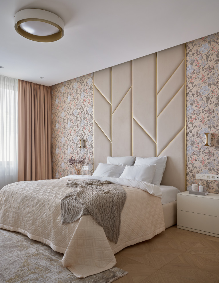 This is an example of a medium sized contemporary master bedroom in Moscow with beige walls, light hardwood flooring, beige floors, panelled walls and a feature wall.