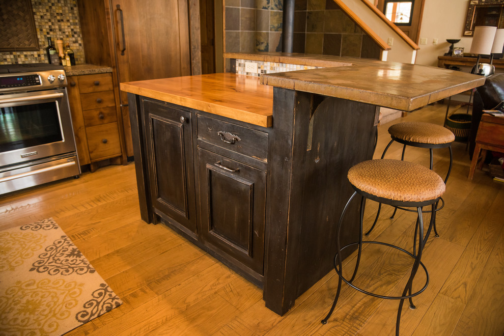Inspiration for a rustic home design remodel in Denver