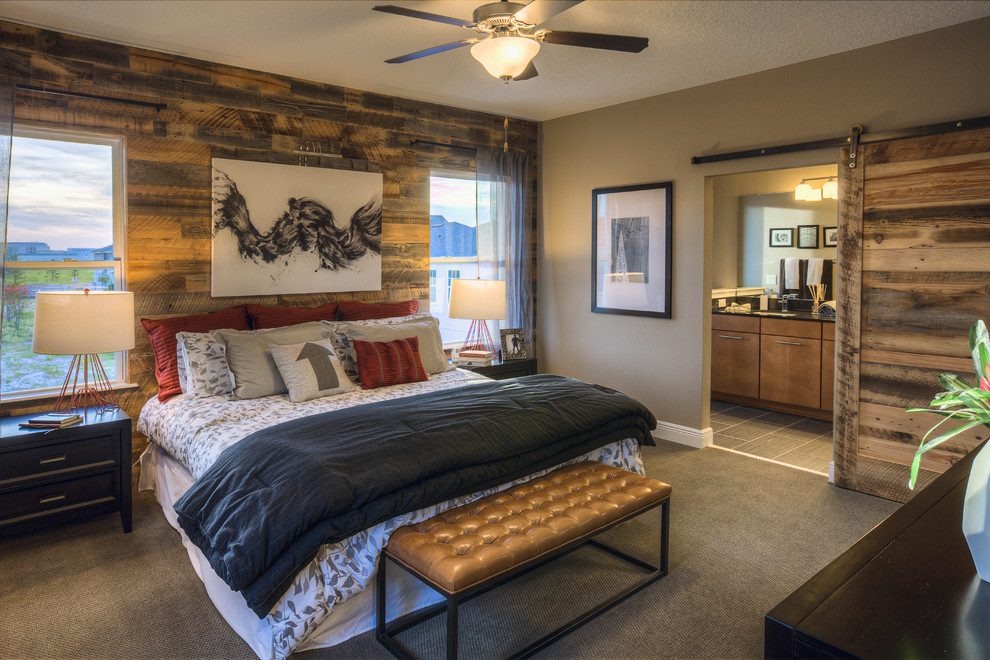 This is an example of a small transitional master bedroom in Orlando with brown walls and carpet.