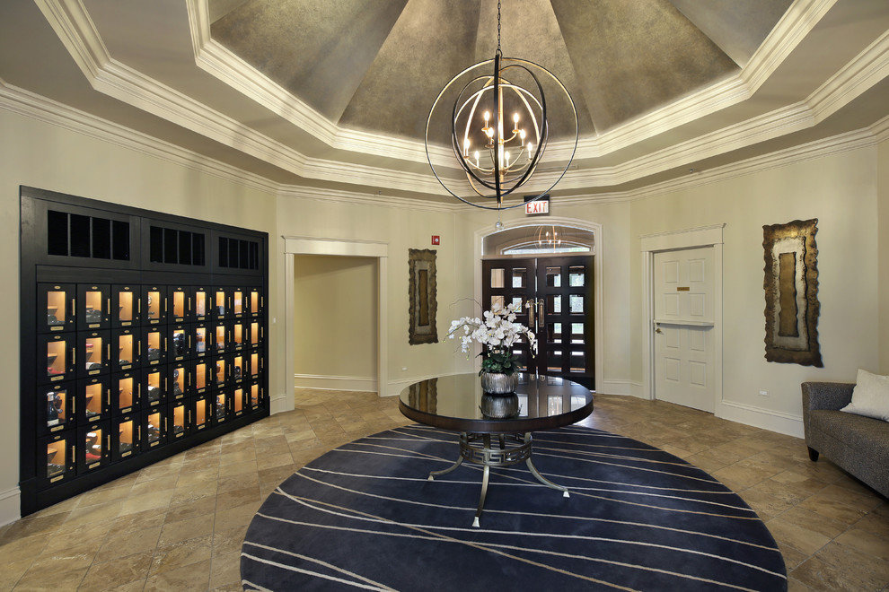 Large transitional beige floor foyer photo in Chicago with beige walls