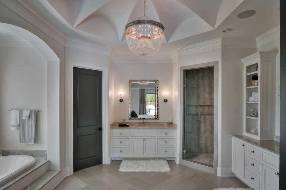 Large transitional master alcove bathtub photo with beaded inset cabinets, gray cabinets and quartz countertops