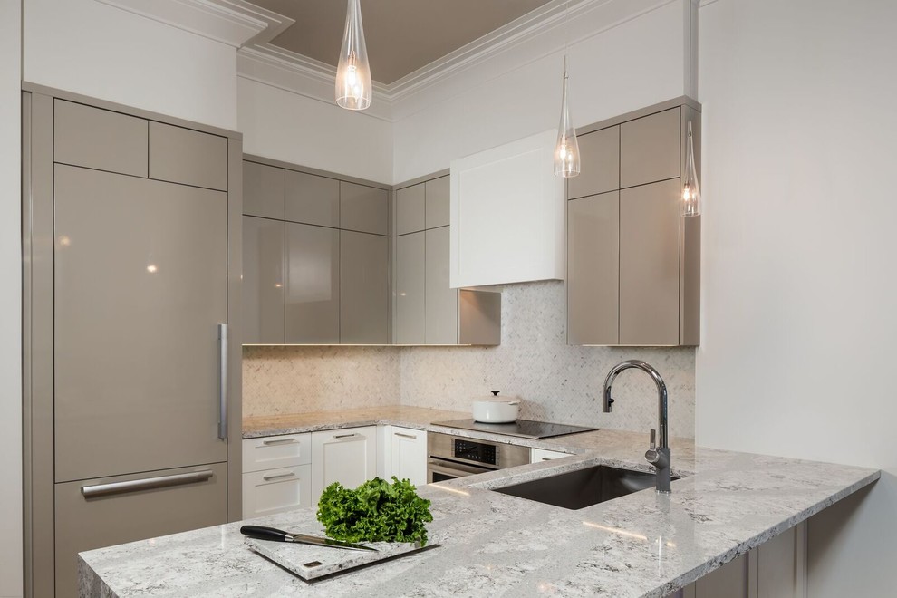 Small transitional u-shaped light wood floor and brown floor open concept kitchen photo in Toronto with an undermount sink, flat-panel cabinets, gray cabinets, granite countertops, gray backsplash, mosaic tile backsplash, stainless steel appliances and a peninsula