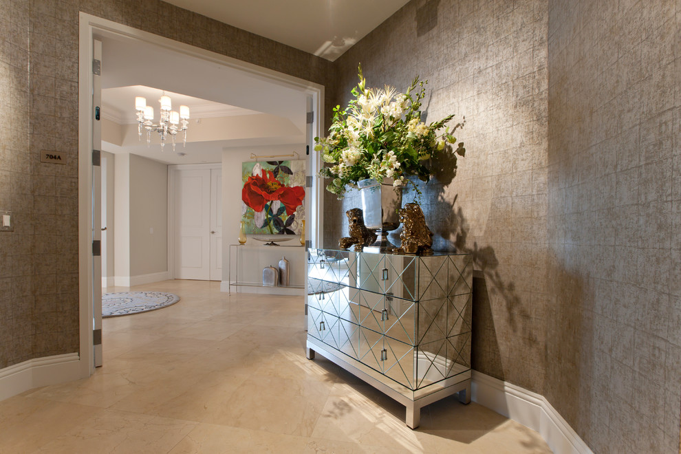 Design ideas for a contemporary entryway in Miami with metallic walls and marble floors.
